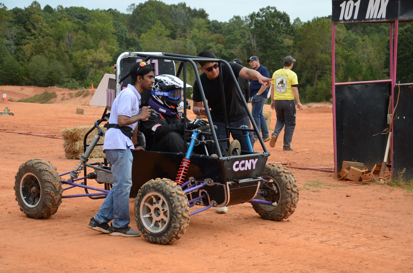 The team prepping the car at the start gate